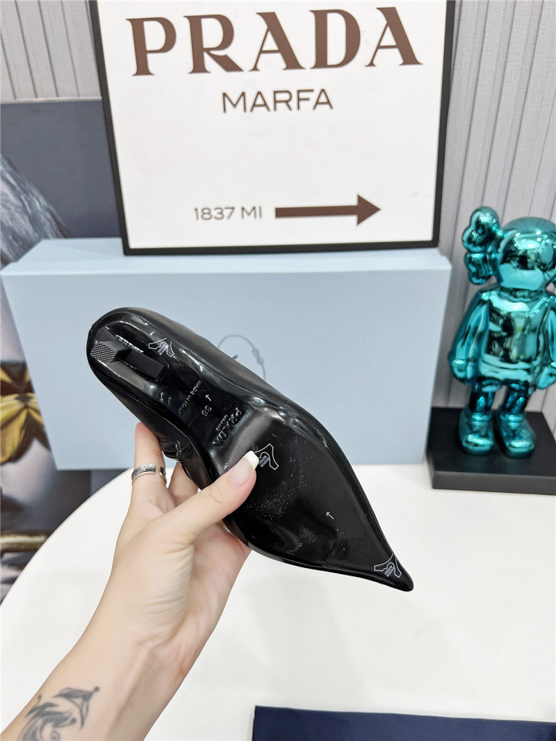 Pra*a black calfskin heeled ankle boots