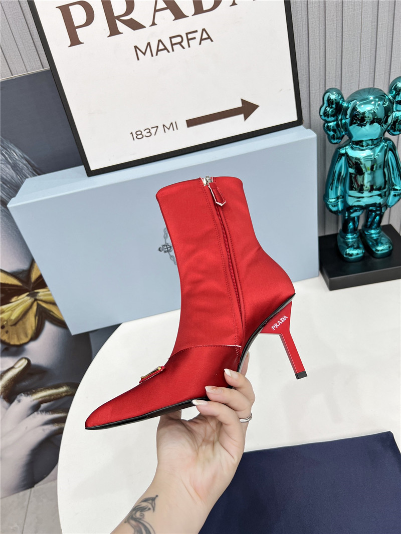 Pra*a red heeled ankle boots