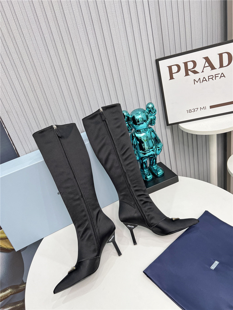 Pra*a black heel knee high boots