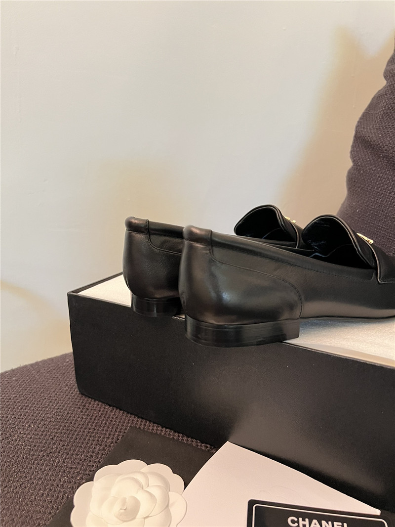 Ch**el pointed toe black leather loafers