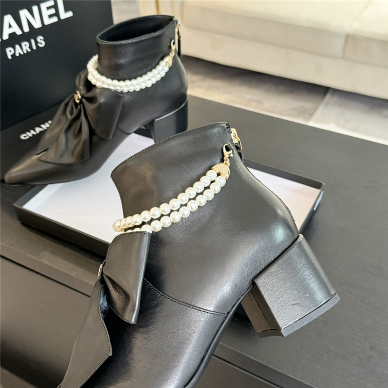 Ch**el black pointed toe pearl bow ankle boots