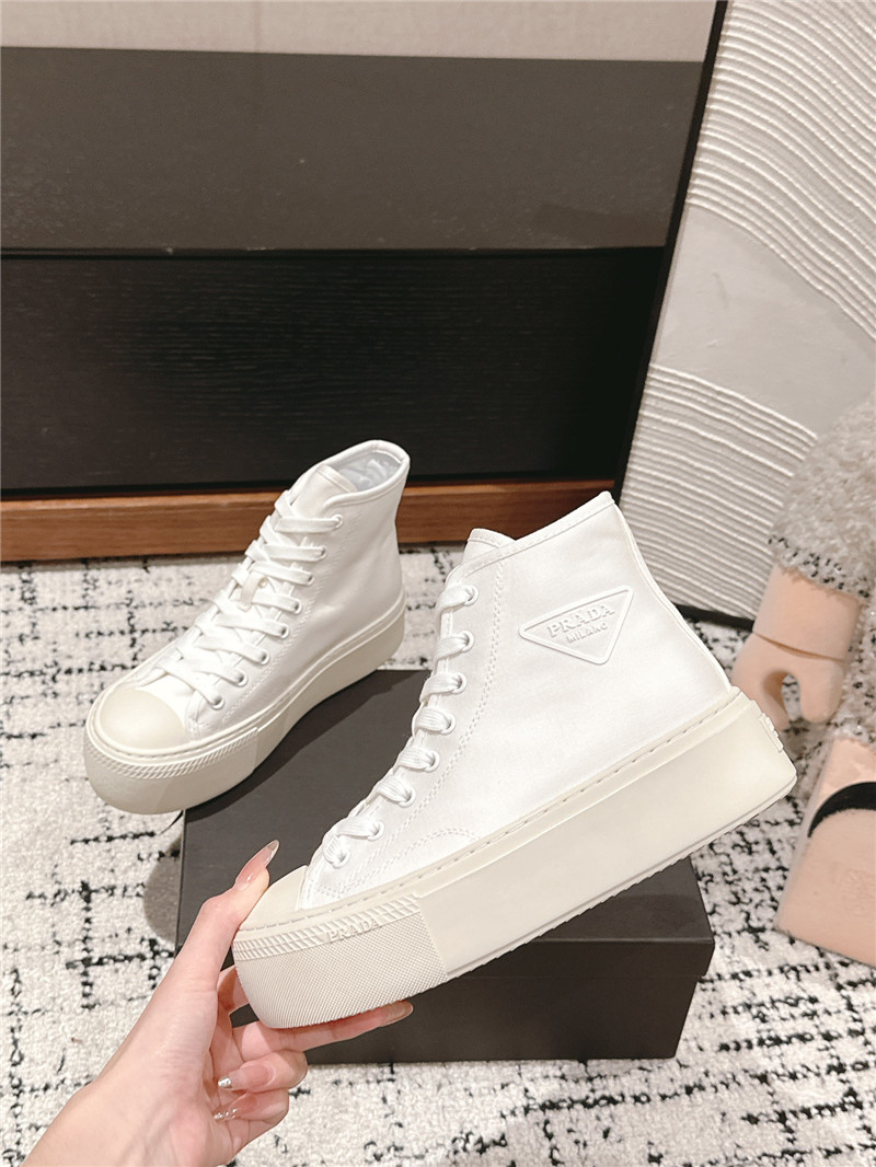 Pra*a white high-top canvas sneakers