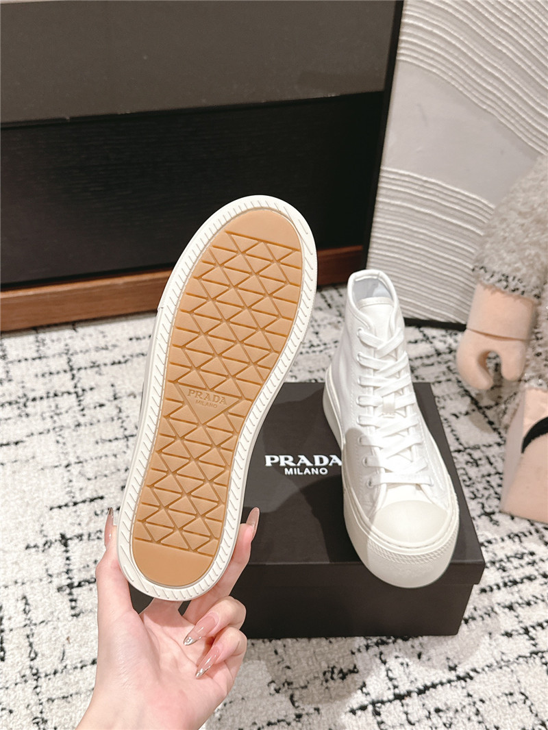 Pra*a white high-top canvas sneakers