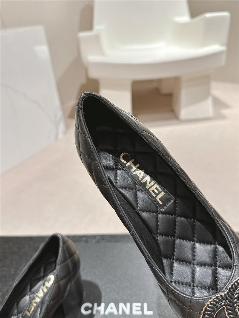 Ch**el black quilted leather cap toe pumps