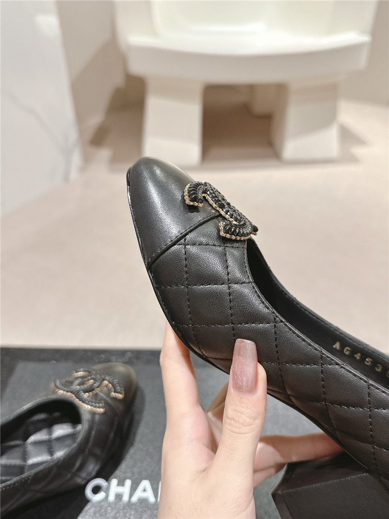 Ch**el black quilted leather cap toe pumps