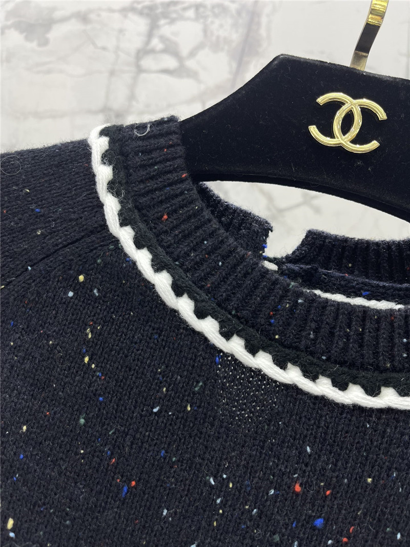 Ch**el white trim wool sweater black