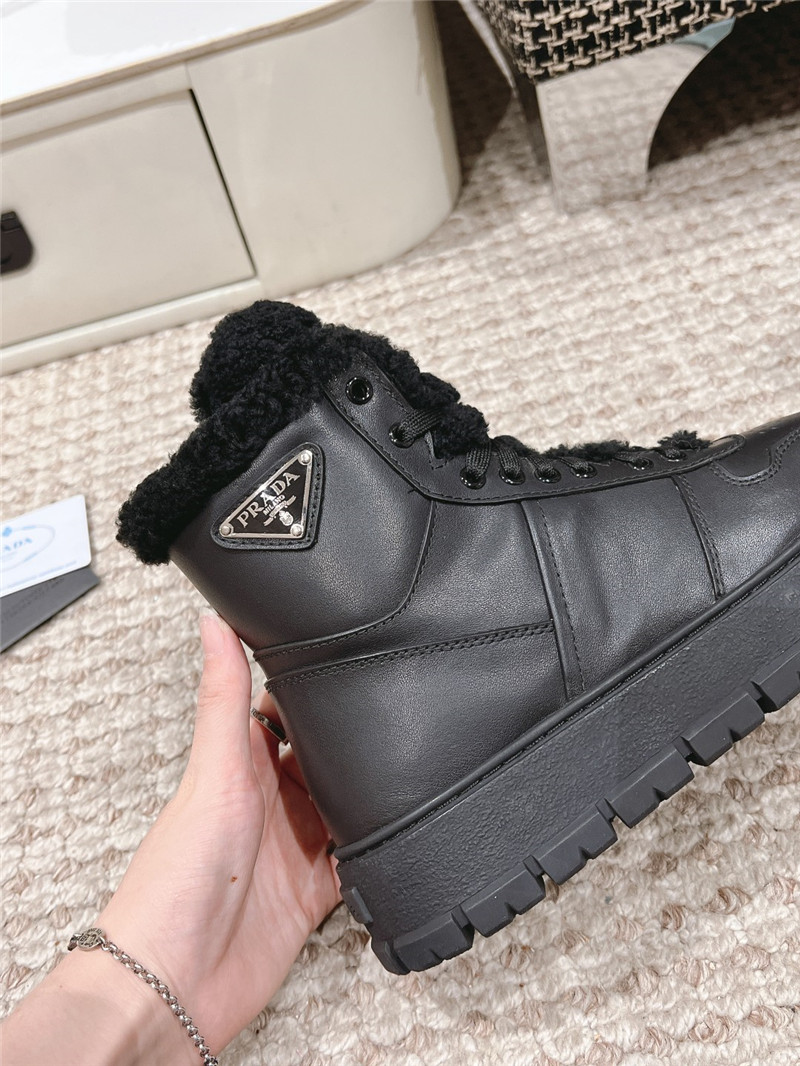 Pra*a black leather high top winter platform sneakers