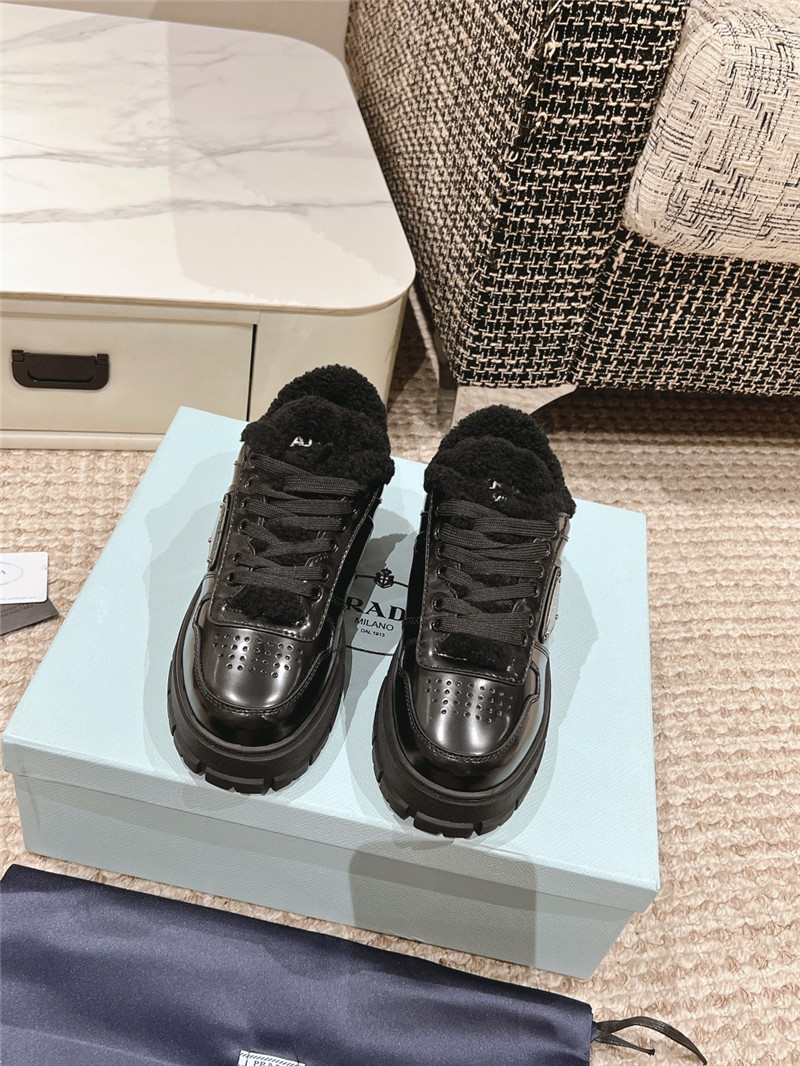 Pra*a black patent leather winter sneakers