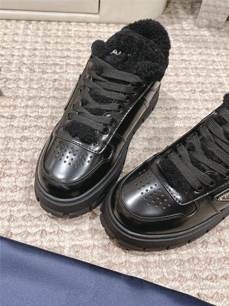 Pra*a black patent leather winter sneakers