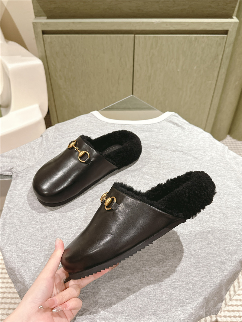 Gvc*1 wool horsebit mule in black leather