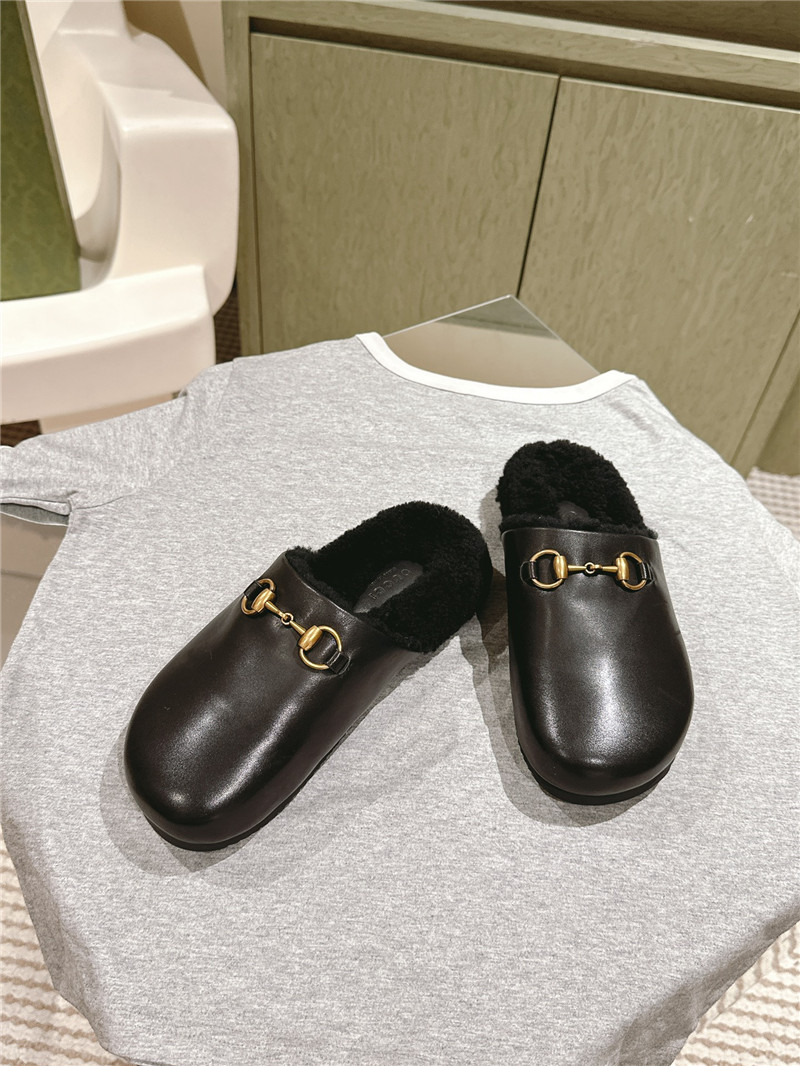 Gvc*1 wool horsebit mule in black leather