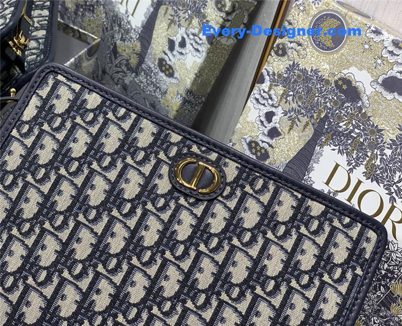 D10r oblique canvas clutch