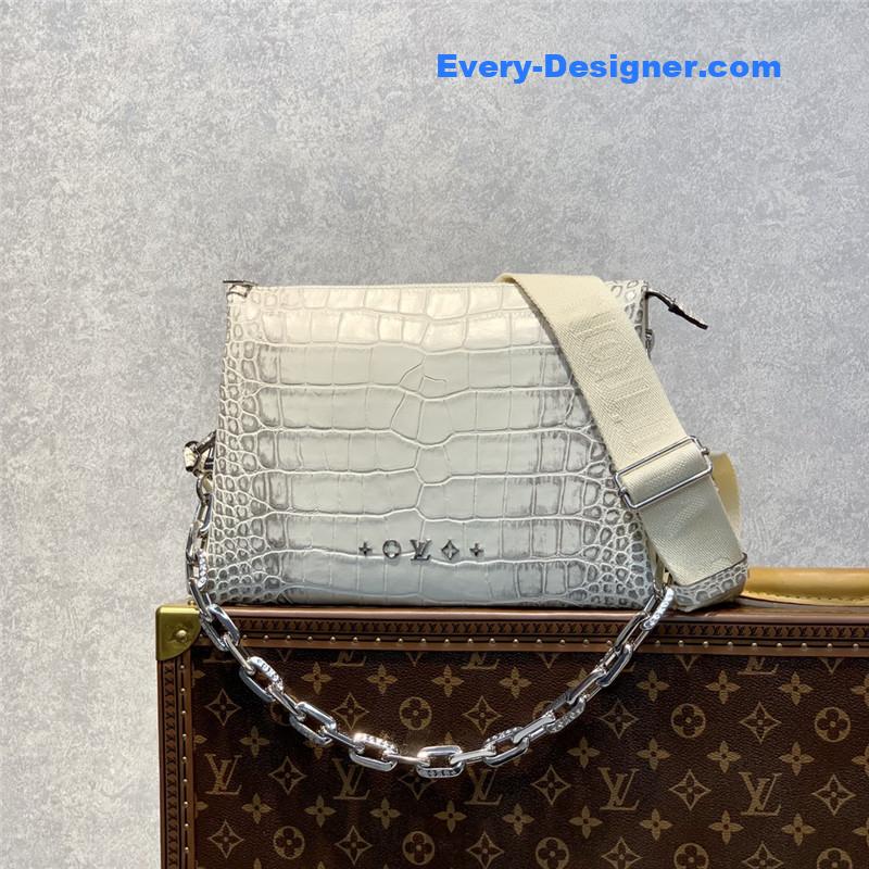 louis vuitton lv crocodile coussin small bag
