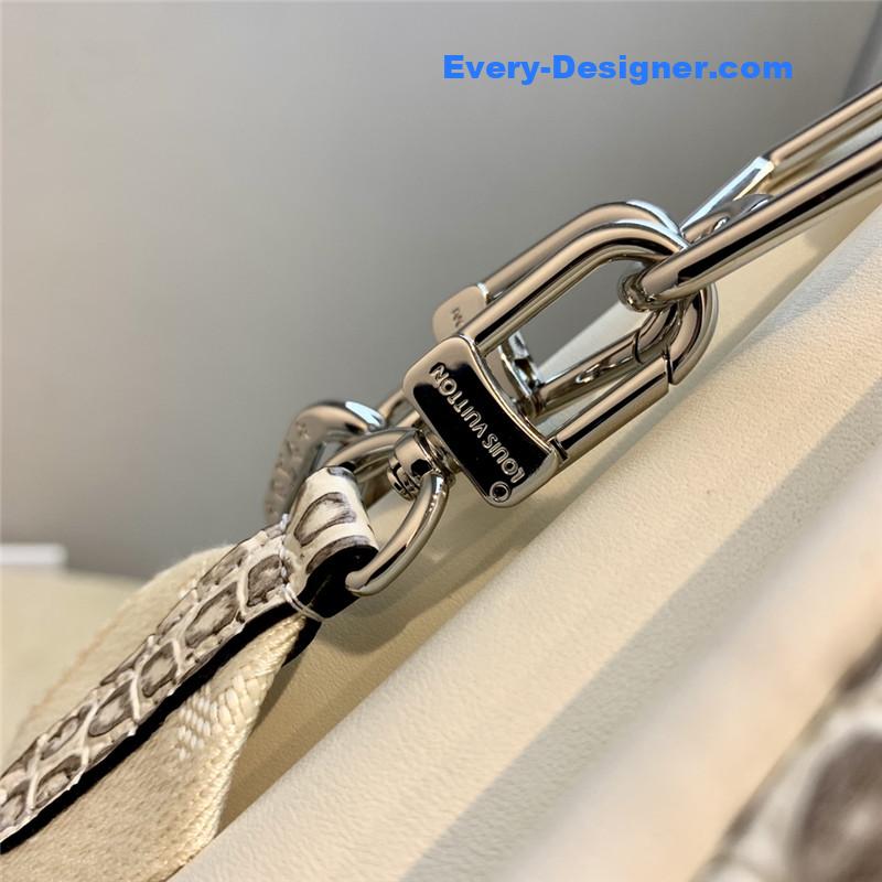 louis vuitton lv crocodile coussin small bag