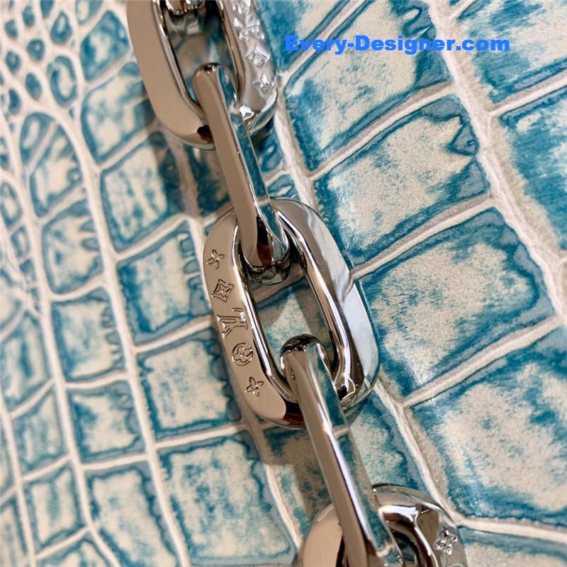 louis vuitton lv crocodile coussin small bag