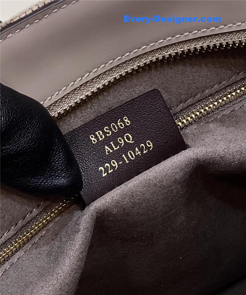 F**di o’clock clutch bag