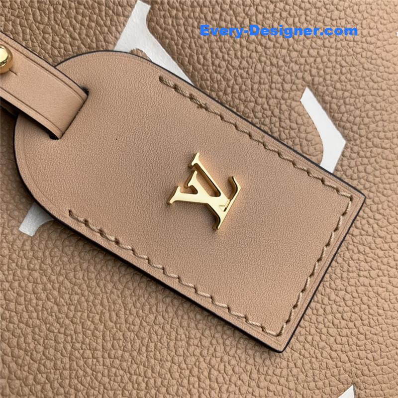 louis vuitton lv carryall small bag