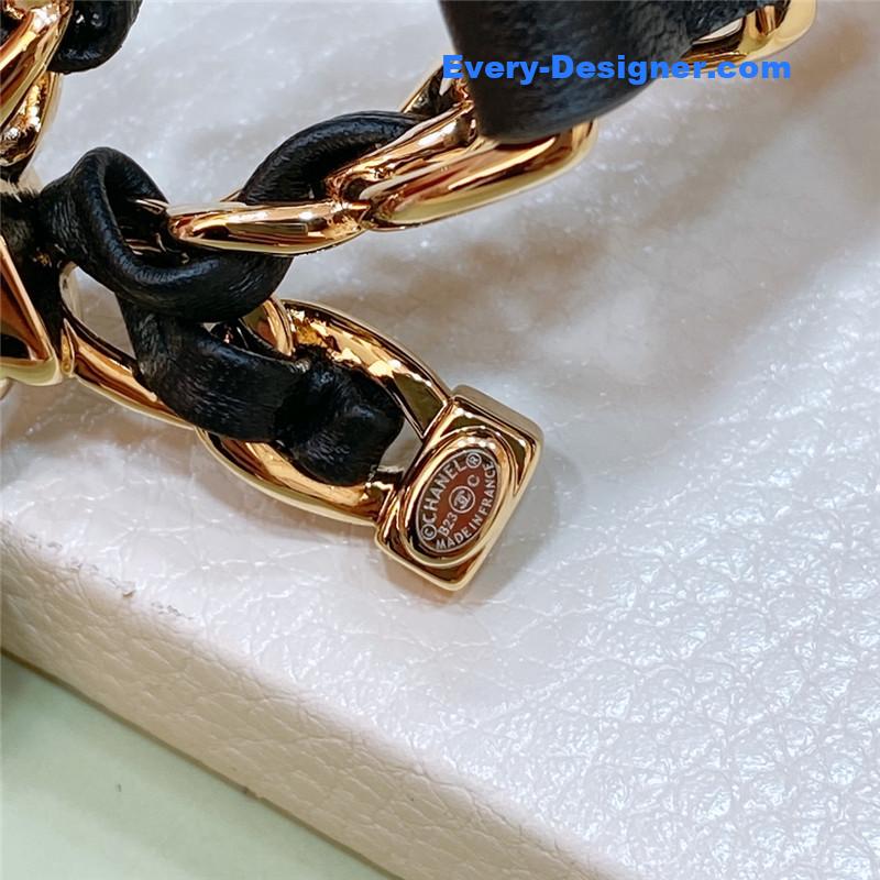 Ch**el bow brass gold-tone metal calfskin belt