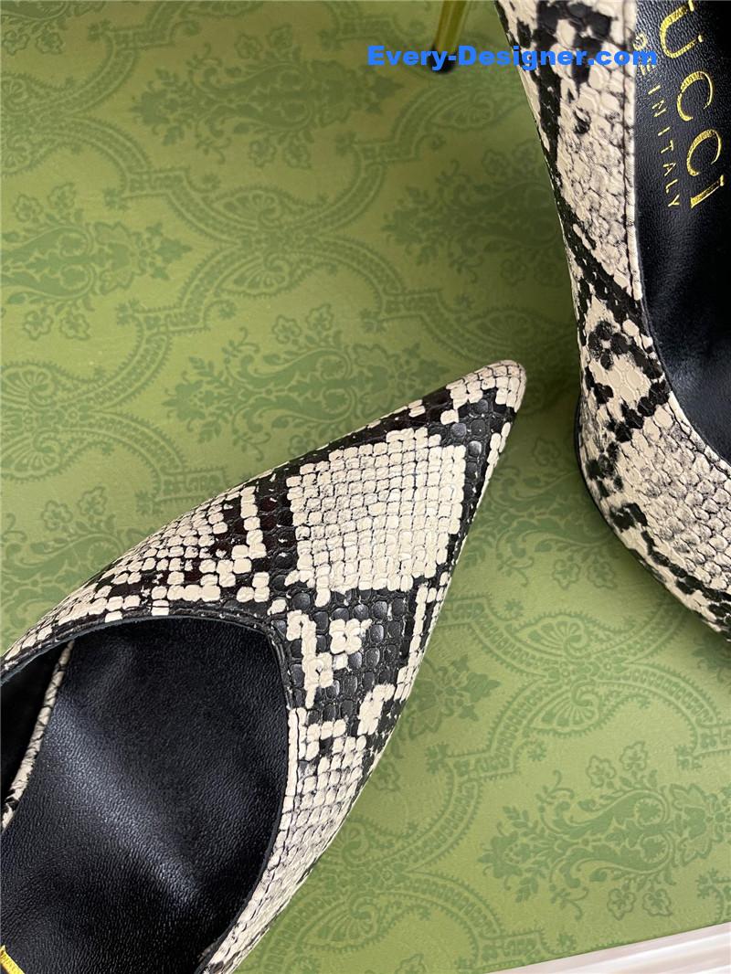 Gvc*1 metal heel pointed high heels