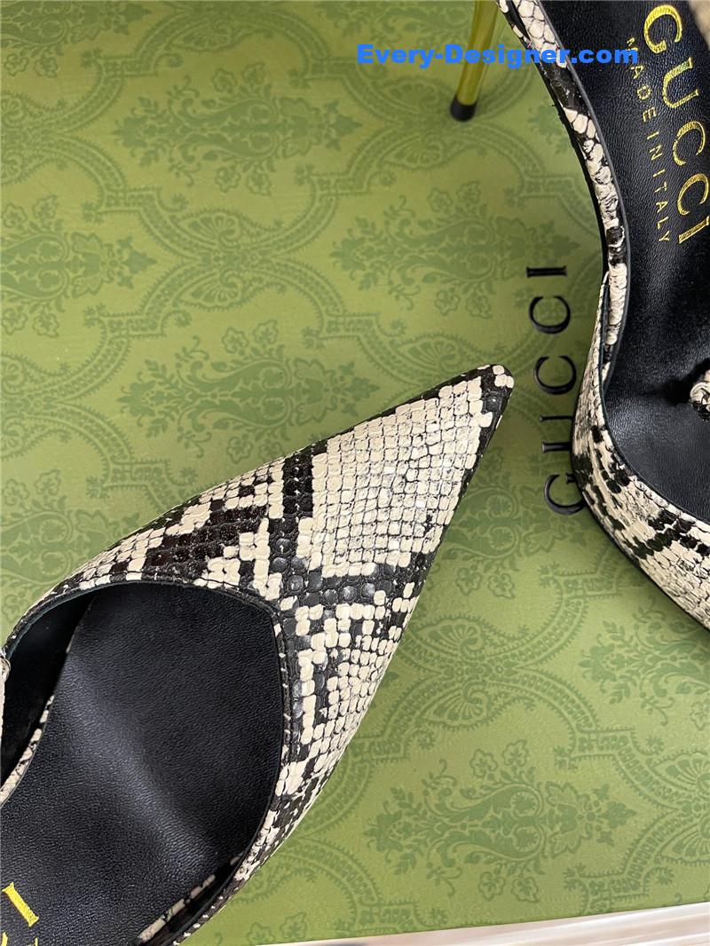 Gvc*1 metal heel pointed sandals