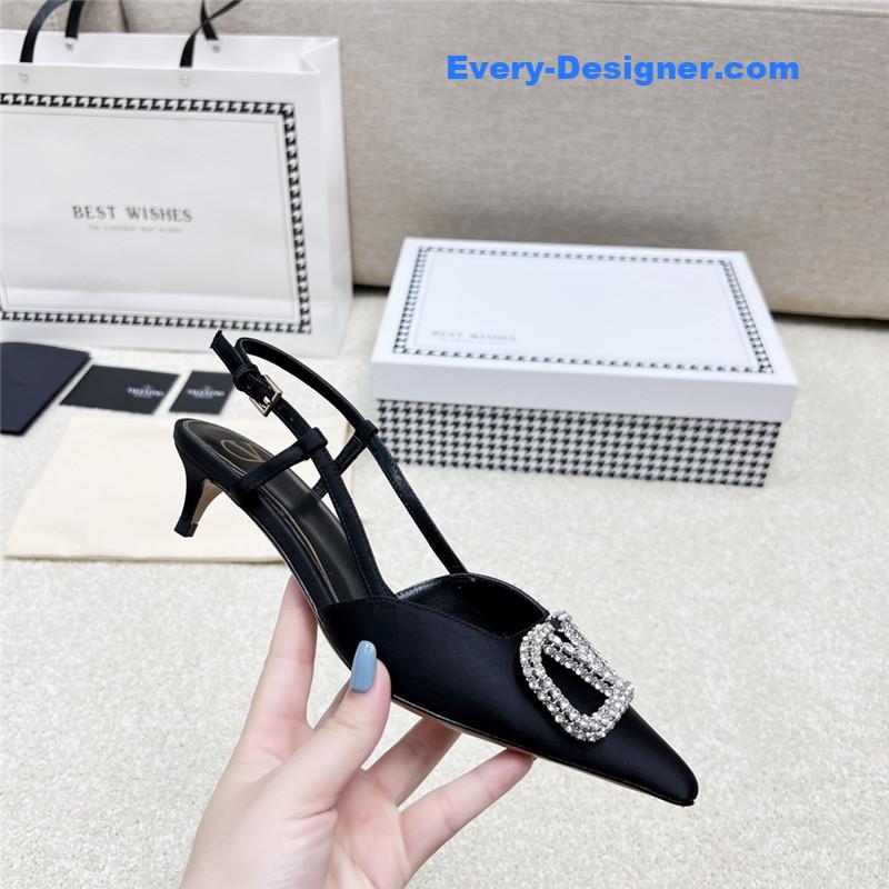Va1e*ntin0 leather buckle pumps