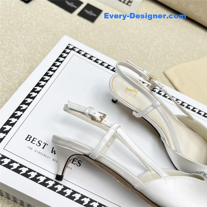 Va1e*ntin0 leather buckle pumps