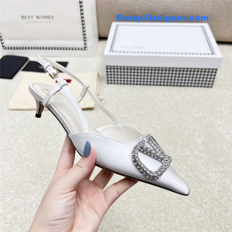 Va1e*ntin0 leather buckle pumps