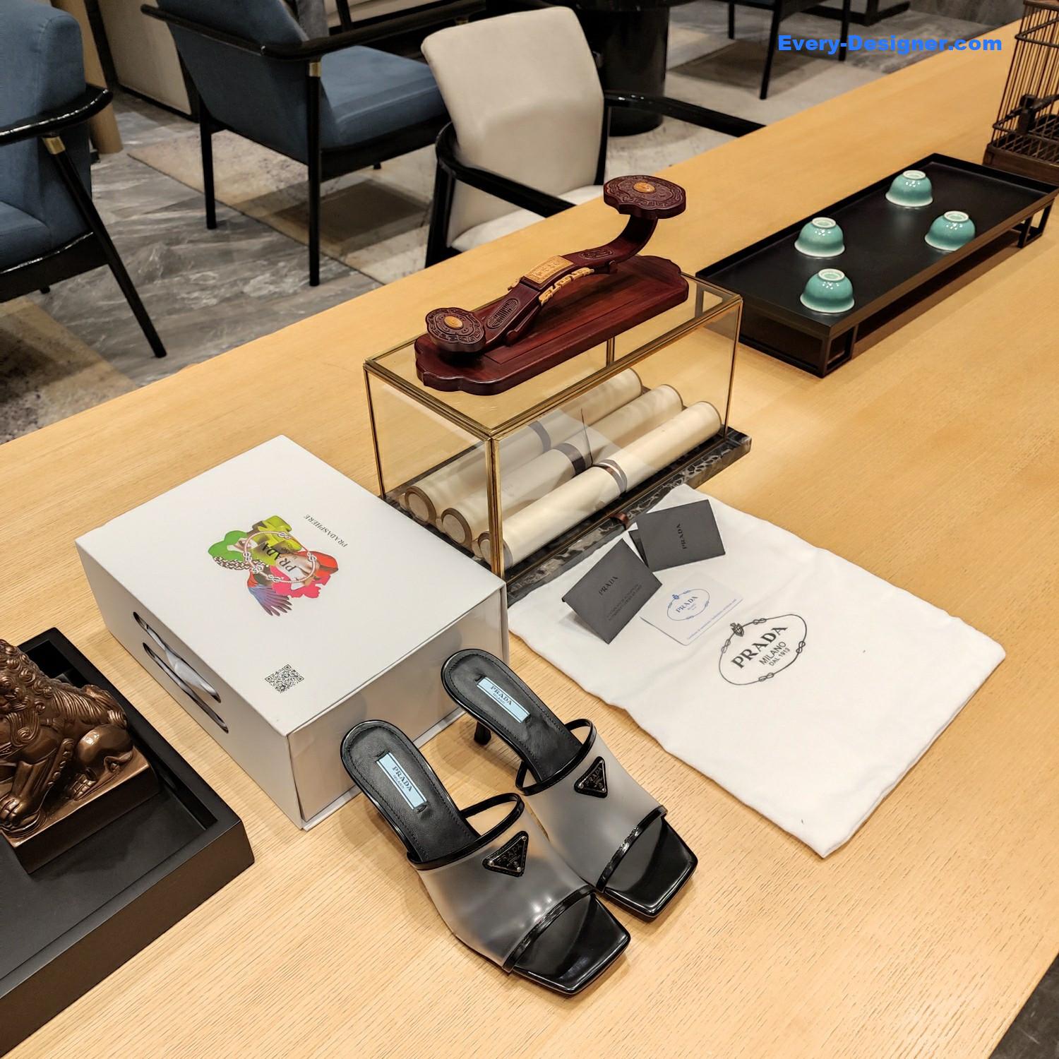 Pra*a metal logo triangle head square sandals