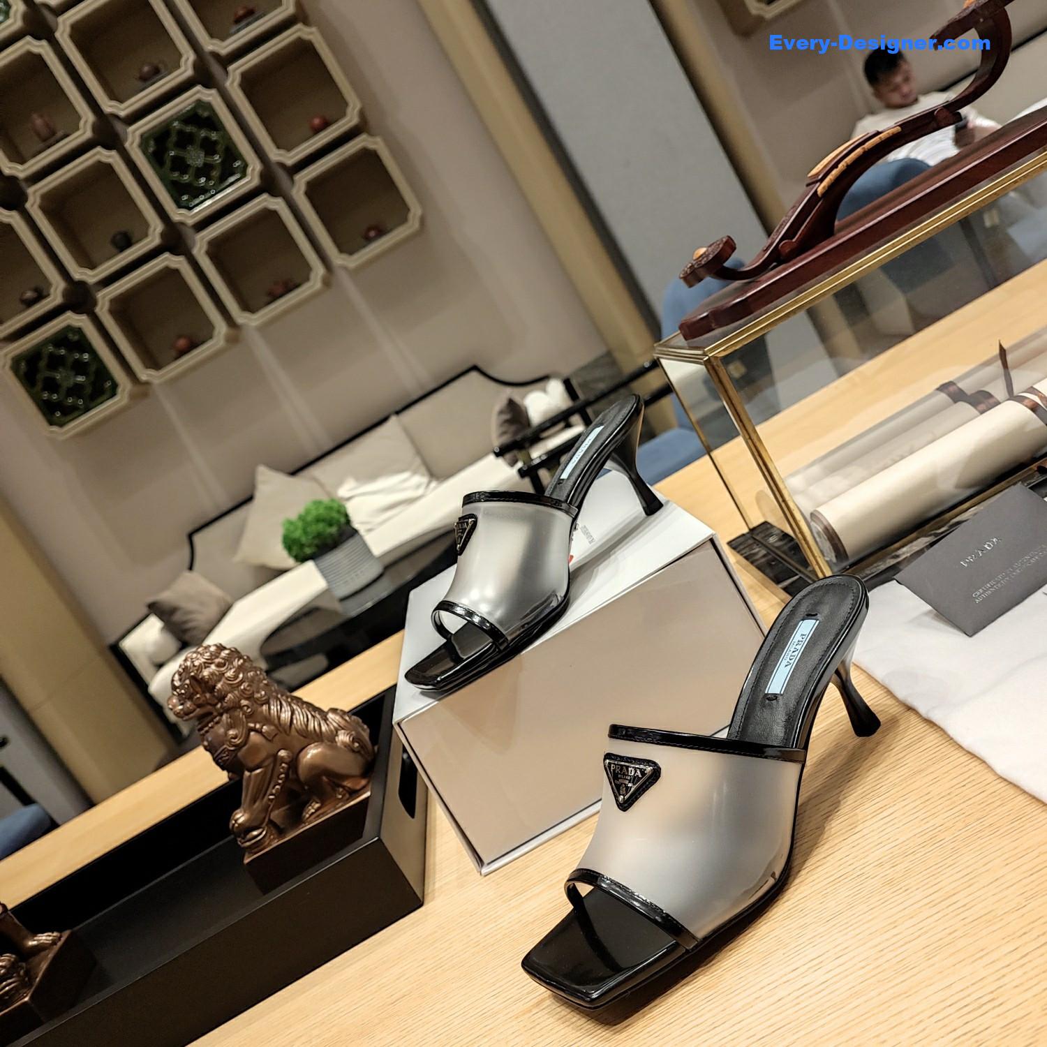 Pra*a metal logo triangle head square sandals