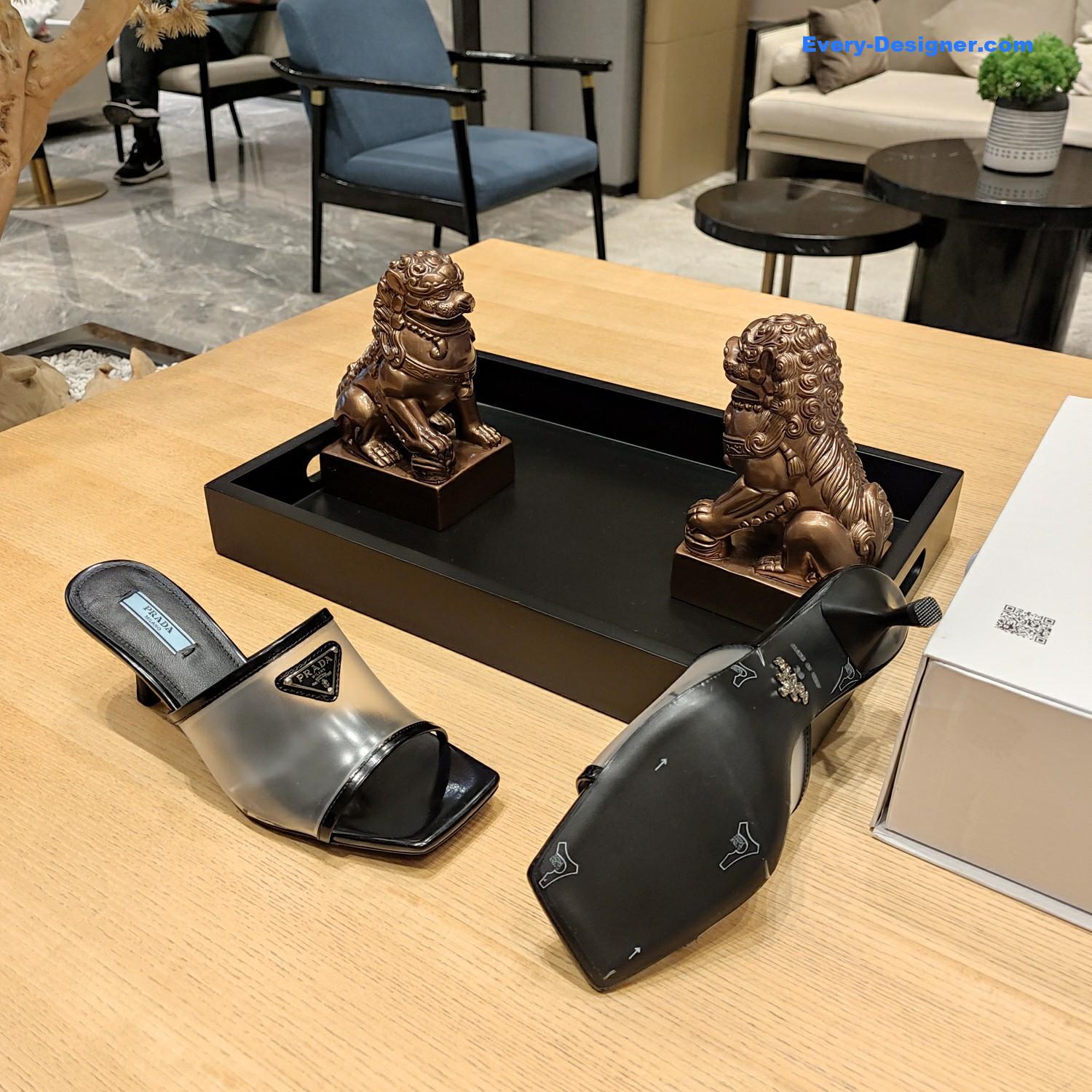 Pra*a metal logo triangle head square sandals