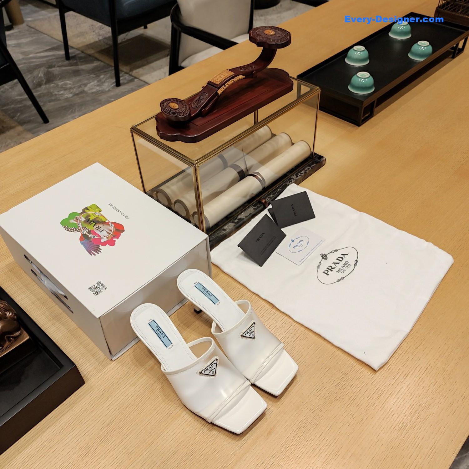 Pra*a metal logo triangle head square sandals