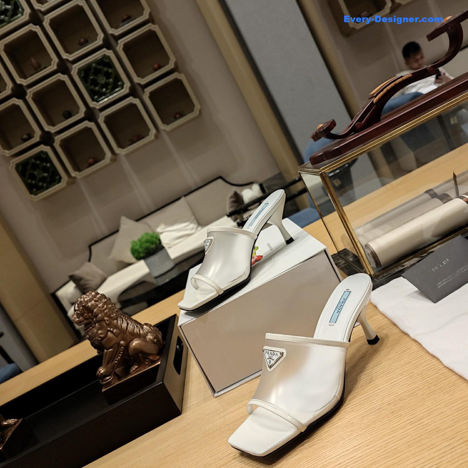 Pra*a metal logo triangle head square sandals