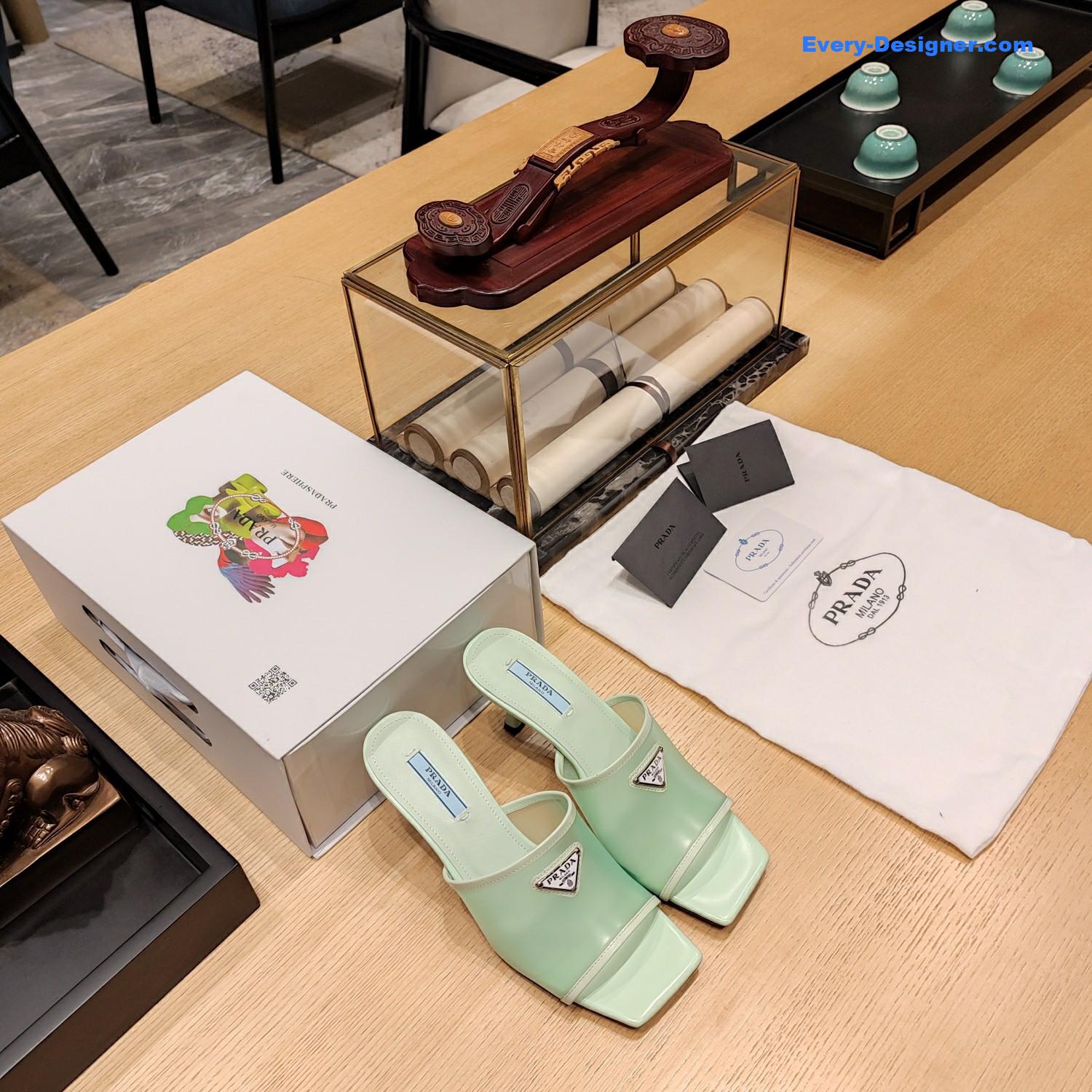 Pra*a metal logo triangle head square sandals