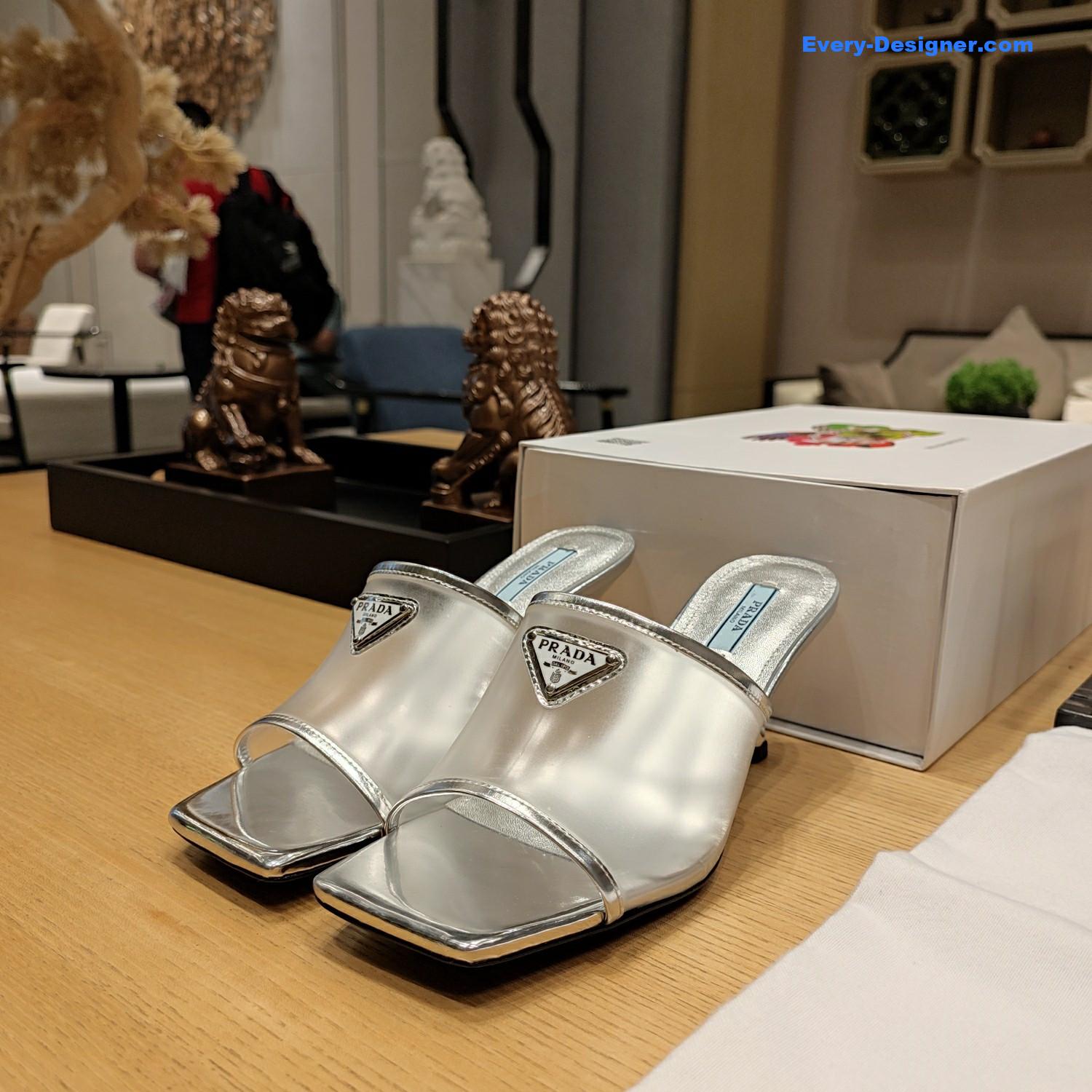 Pra*a metal logo triangle head square sandals