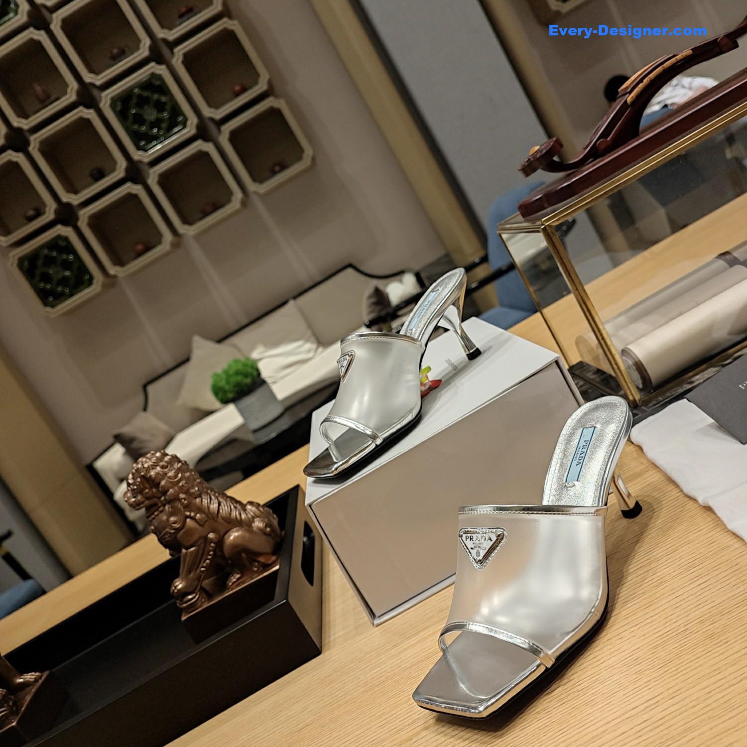 Pra*a metal logo triangle head square sandals