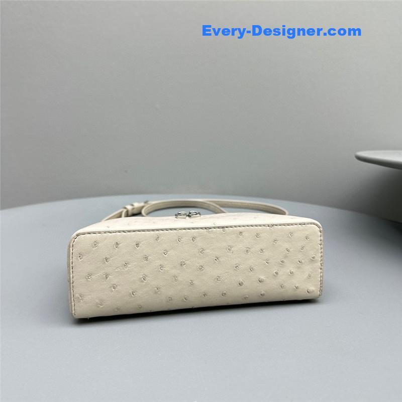 L0r0 P1ana extra pocket ostrich leather pouch