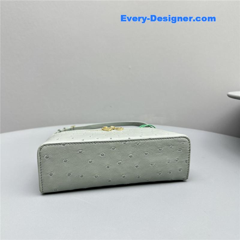 L0r0 P1ana extra pocket ostrich leather pouch