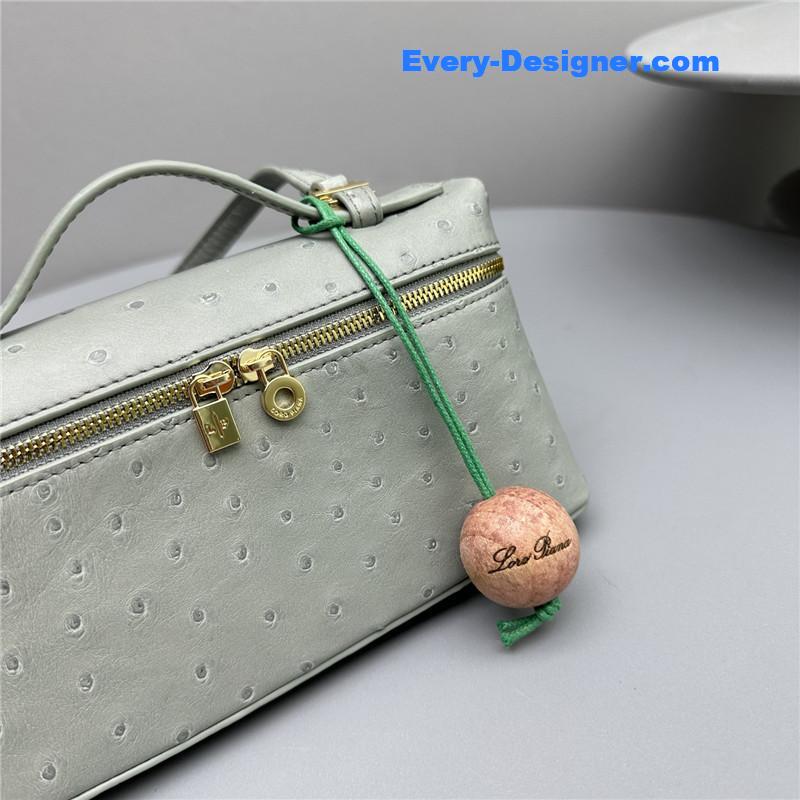 L0r0 P1ana extra pocket ostrich leather pouch