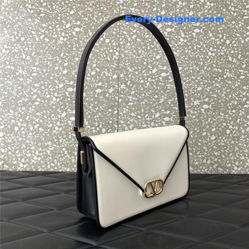 Va1e*ntin0 garavani letter leather shoulder bag