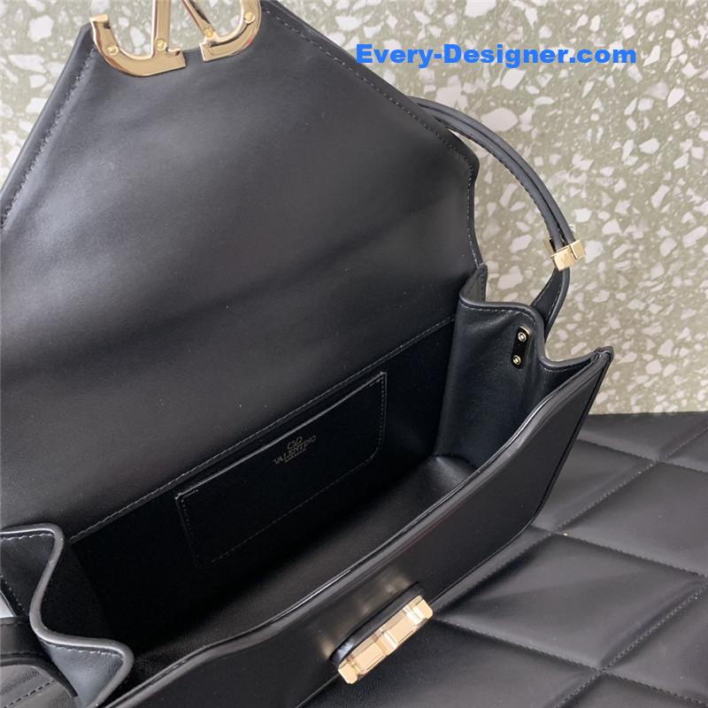 Va1e*ntin0 garavani letter leather shoulder bag