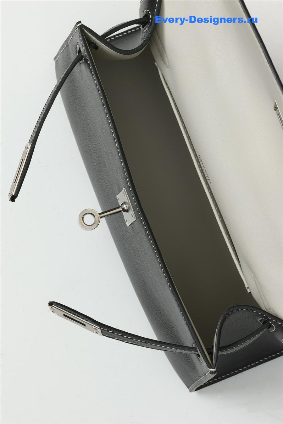 H**me5 kelly pochette swift leather bag black