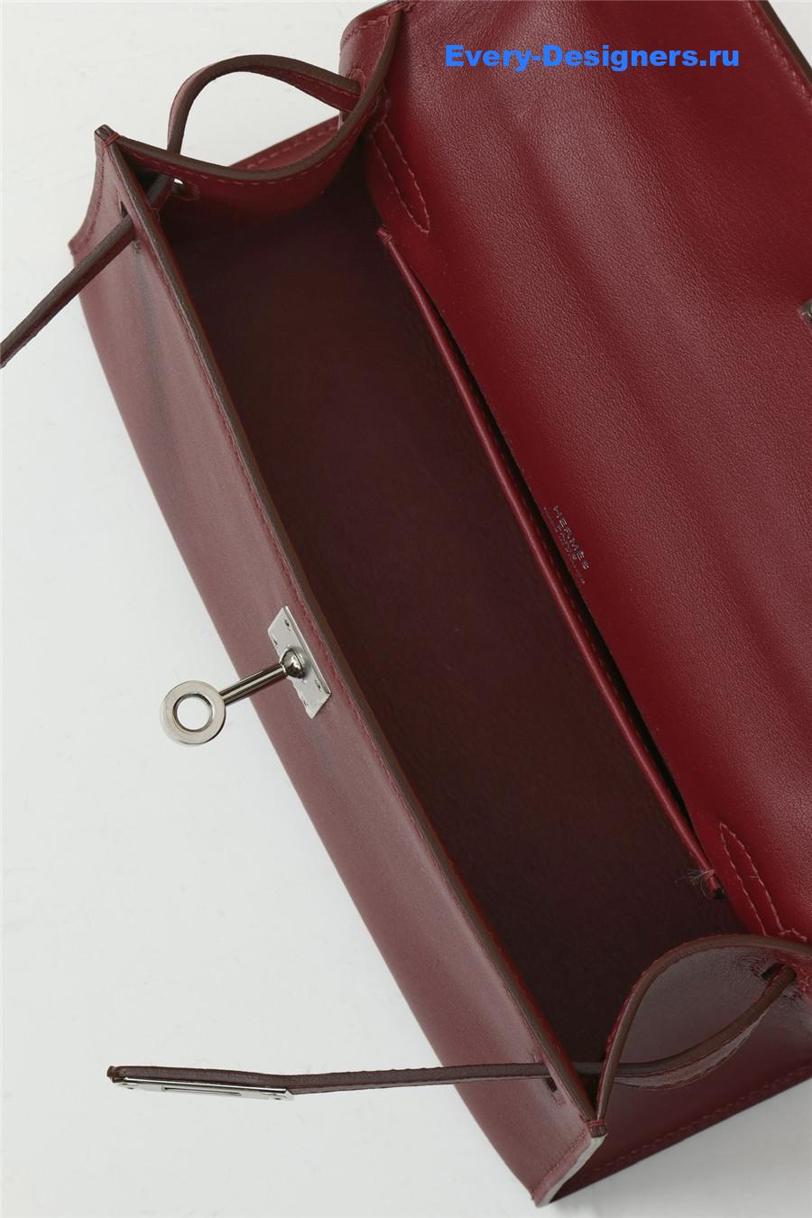 H**me5 kelly pochette swift leather bag red