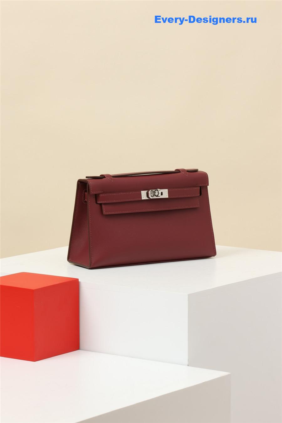 H**me5 kelly pochette swift leather bag red