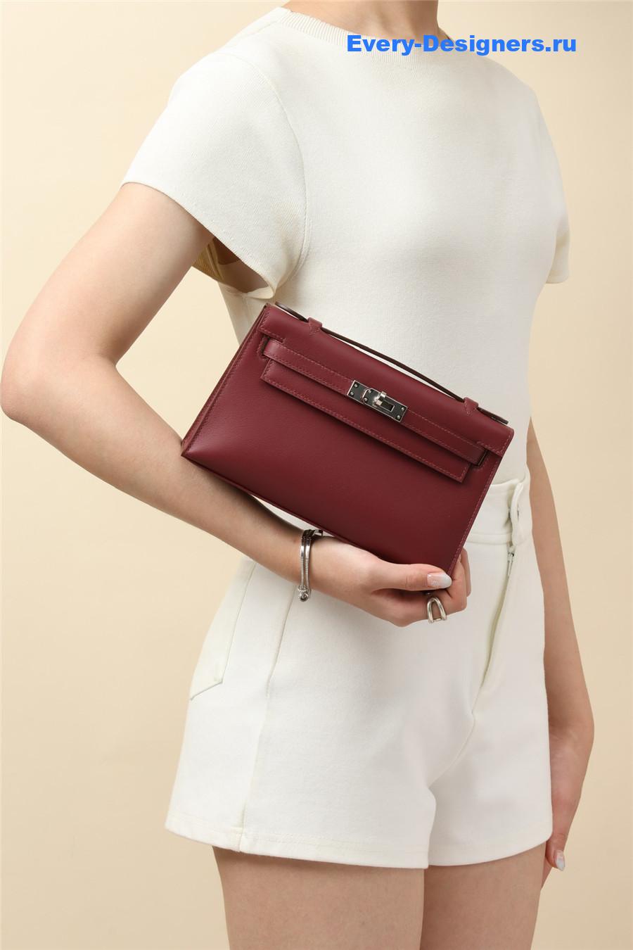 H**me5 kelly pochette swift leather bag red