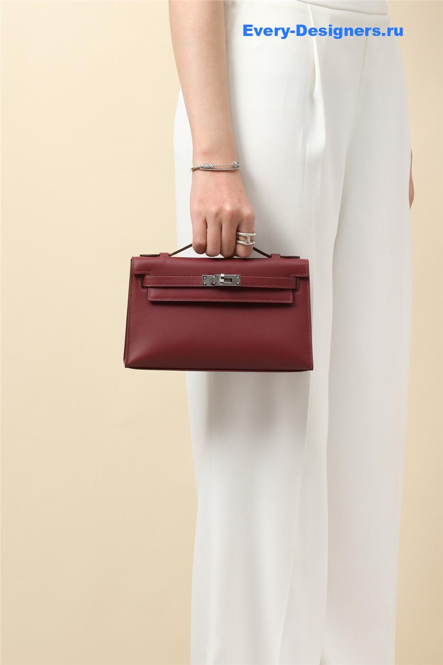 H**me5 kelly pochette swift leather bag red