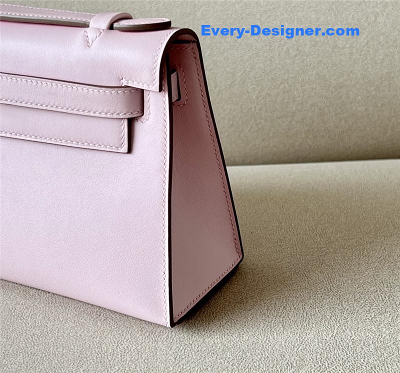 H**me5 kelly pochette swift leather bag