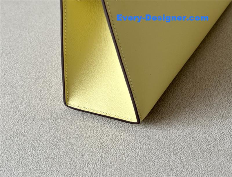 H**me5 kelly pochette swift leather bag