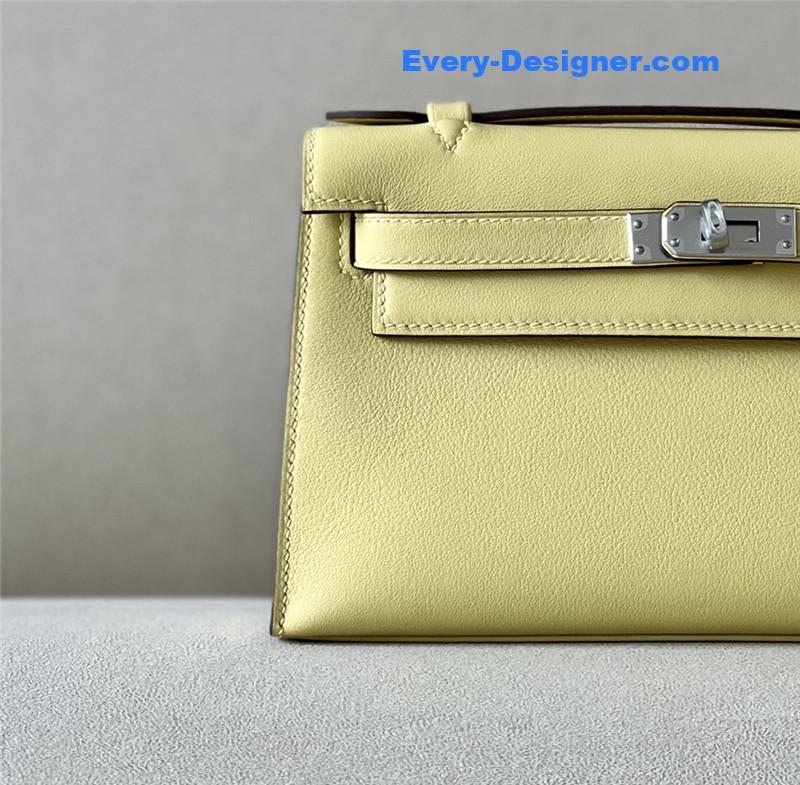 H**me5 kelly pochette swift leather bag