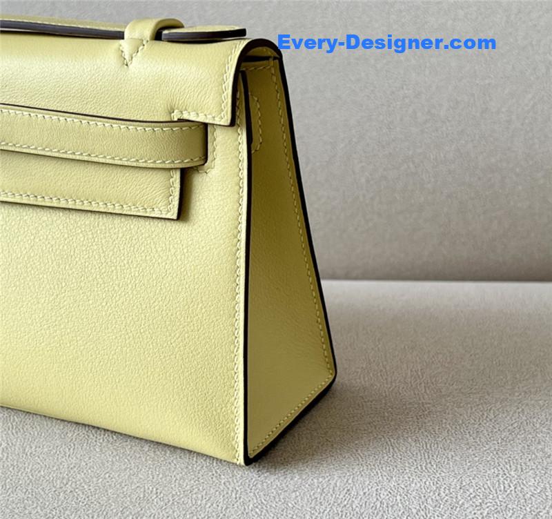 H**me5 kelly pochette swift leather bag