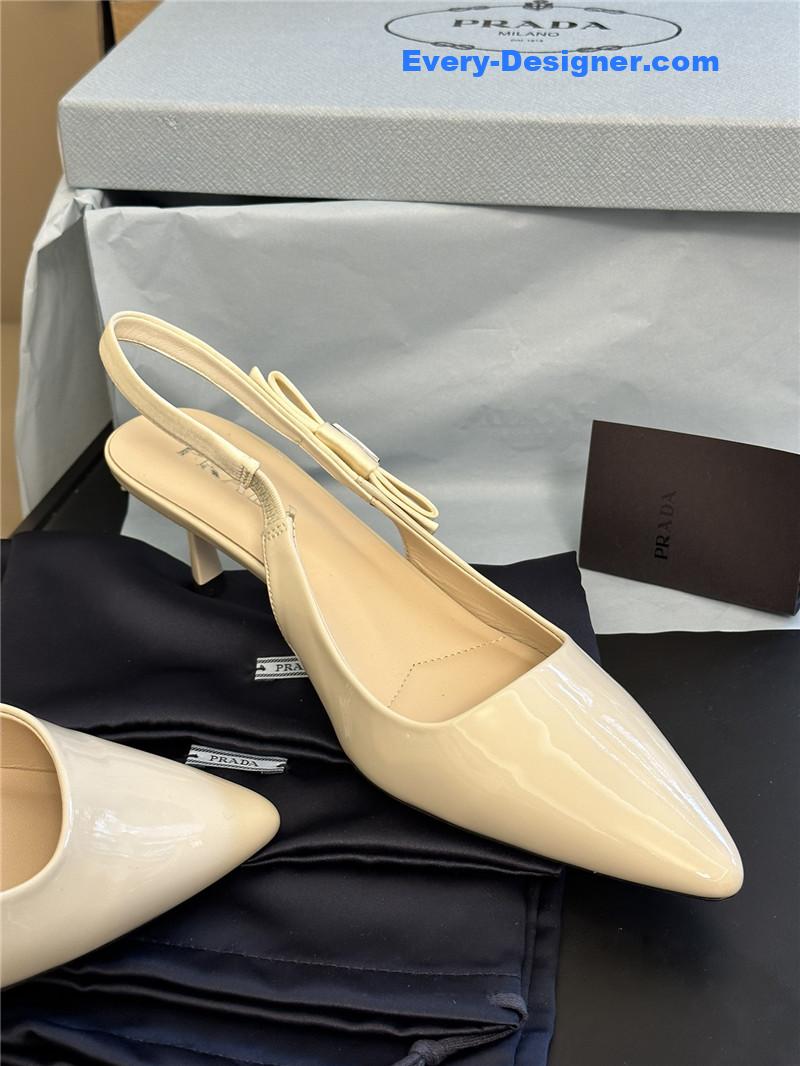 Pra*a paneled satin bow pumps
